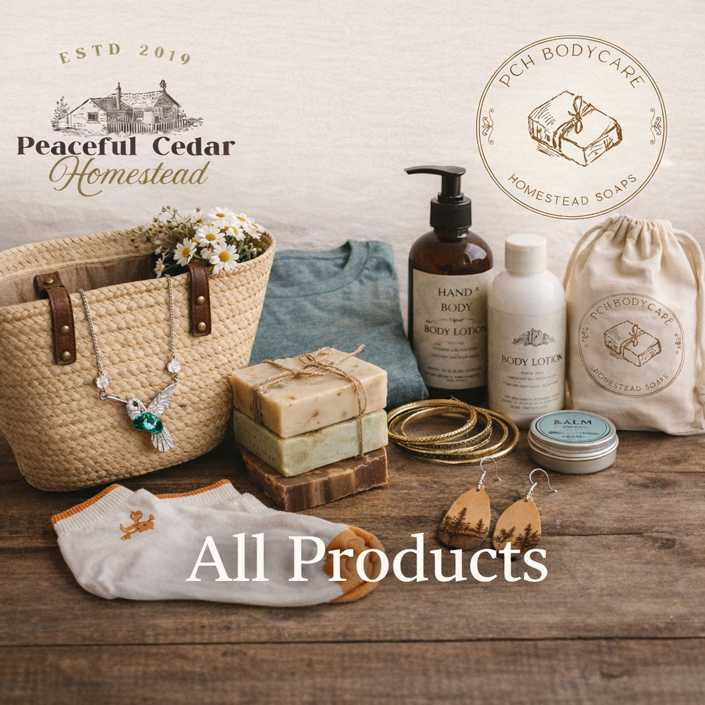 A rustic display featuring soaps, body care bottles, jewelry, socks, and a woven handbag arranged on a wooden table, alongside the Peaceful Cedar Homestead and PCH BodyCare logos